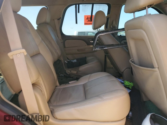 2011 Chevrolet Tahoe LT z VIN 1GNSCBE04BR270200, wystawiony jako Copart lot #53333725 z przebiegiem 228 399 mil mil oraz Szkoda całkowita • Salvage title. Historia ofert i sprzedaży dostępna na DreamBid. Obrazek 11.