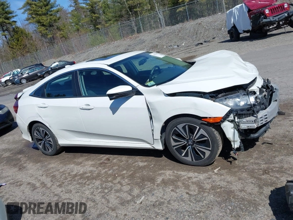 2017 Honda Civic EX-T with VIN 2HGFC1E39HH644602, listed as a IAAI auction lot 41920127 with 102,360 mi miles and . Bid and sale history available at DreamBid. Image 14.