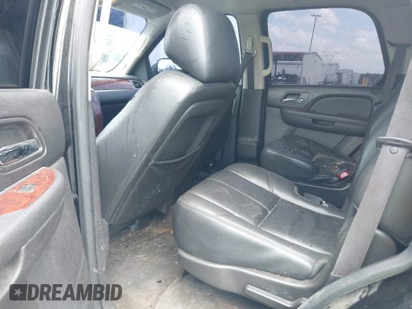 2013 Chevrolet Tahoe LT with VIN 1GNSCBE00DR337071, listed as a IAAI auction lot 42282457 with 151,460 mi miles and . Bid and sale history available at DreamBid. Image 8.