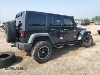 2012 Jeep Wrangler Unlimited Sport with VIN 1C4BJWDG8CL116811, listed as a Copart auction lot 59372085 with 95,498 mi miles and Salvage title. Bid and sale history available at DreamBid. Image 3.