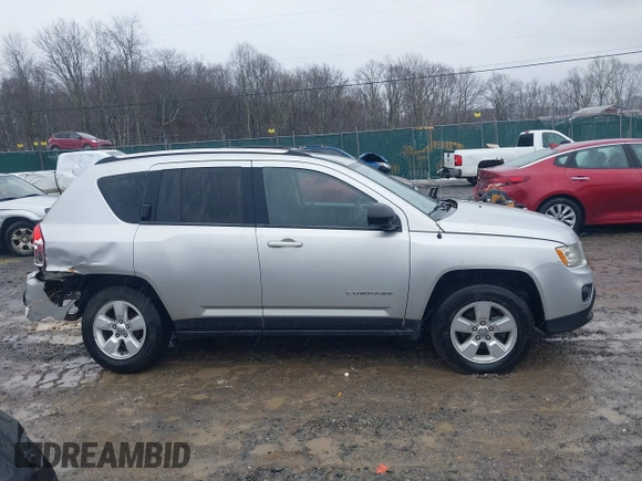 2013 Jeep Compass Sport with VIN 1C4NJCBA8DD264902, listed as a IAAI auction lot 41440255 with 144,877 mi miles. Bid and sale history available at carsss.com. Image 13.