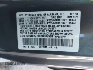 2011 Honda Odyssey Touring with VIN 5FNRL5H96BB009580, listed as a IAAI auction lot 42202595 with Not provided miles and . Bid and sale history available at DreamBid. Image 9.
