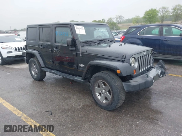 2013 Jeep Wrangler Unlimited Sport z VIN 1C4BJWDGXDL596450, wystawiony jako IAAI lot #42323862 z przebiegiem 114 105 mil mil oraz . Historia ofert i sprzedaży dostępna na DreamBid. Obrazek 1.