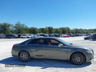 2017 Lincoln Continental Select with VIN 1LN6L9TK1H5617355, listed as a IAAI auction lot 40404909 with 108,208 mi miles and . Bid and sale history available at DreamBid. Image 13.