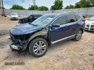 2020 Honda CR-V Touring с VIN 2HKRW2H9XLH631074, выставлен на аукционе Copart как лот 62957255 с пробегом 21 460 миль миль и Списание • Salvage title. История ставок и продаж доступна на DreamBid. Изображение 1.