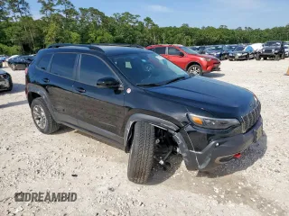 2022 Jeep Cherokee Trailhawk with VIN 1C4PJMBX5ND549240, listed as a Copart auction lot 56743785 with 11,392 mi miles and Salvage title. Bid and sale history available at DreamBid. Image 4.