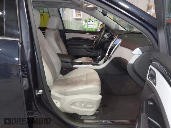 2016 Cadillac SRX Luxury Collection z VIN 3GYFNEE38GS565721, wystawiony jako IAAI lot #41963005 z przebiegiem 87 005 mil mil oraz . Historia ofert i sprzedaży dostępna na DreamBid. Obrazek 5.