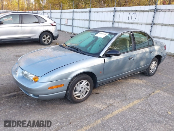 2002 Saturn SL z VIN 1G8ZS528327278417, wystawiony jako IAAI lot #40611406 z przebiegiem 227 283 mil mil oraz . Historia ofert i sprzedaży dostępna na DreamBid. Obrazek 2.