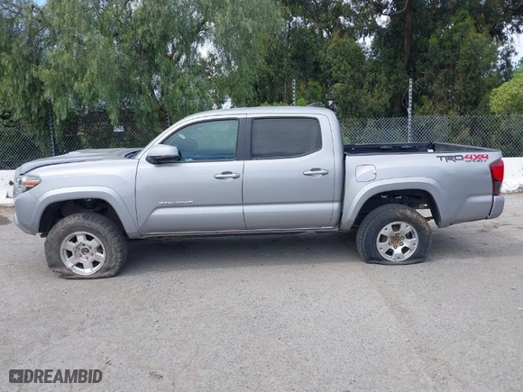 2019 Toyota Tacoma 4WD SR with VIN 3TMCZ5AN4KM194526, listed as a IAAI auction lot 42021504 with 87,767 mi miles. Bid and sale history available at carsss.com. Image 14.