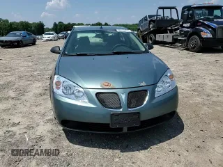 2009 Pontiac G6 1SA with VIN 1G2ZG57B294112753, listed as a Copart auction lot 60333295 with 172,422 mi miles and Salvage title. Bid and sale history available at DreamBid. Image 13.