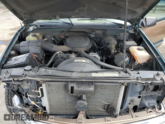 1995 GMC Sierra 1500 z VIN 2GTEK19K3S1511767, wystawiony jako Copart lot #51977295 z przebiegiem 215 667 mil mil oraz Szkody całkowita. Historia ofert i sprzedaży dostępna na DreamBid. Obrazek 11.
