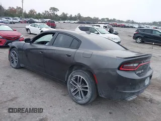 2019 Dodge Charger SXT with VIN 2C3CDXJG1KH730489, listed as a IAAI auction lot 41189171 with 39,514 mi miles and . Bid and sale history available at DreamBid. Image 3.