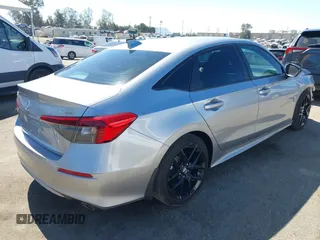 2023 Honda Civic Sport with VIN 2HGFE2F56PH500505, listed as a IAAI auction lot 42239112 with 39,513 mi miles and . Bid and sale history available at DreamBid. Image 4.