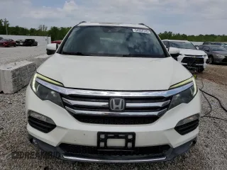 2016 Honda Pilot Touring with VIN 5FNYF6H92GB057531, listed as a Copart auction lot 54354145 with 86,806 mi miles and Salvage Title. Bid and sale history available at DreamBid. Image 5.
