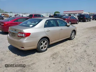 2011 Toyota Corolla L with VIN 2T1BU4EE1BC634175, listed as a IAAI auction lot 42073944 with 179,083 mi miles. Bid and sale history available at carsss.com. Image 4.
