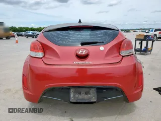 2013 Hyundai Veloster w/Gray Int z VIN KMHTC6AD7DU142655, wystawiony jako Copart lot #56233005 z przebiegiem 181 297 mil mil oraz Czysty tytuł • Clean title. Historia ofert i sprzedaży dostępna na DreamBid. Obrazek 6.
