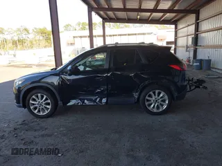 2013 Mazda CX-5 Grand Touring with VIN JM3KE2DE4D0127827, listed as a IAAI auction lot 41817214 with 108,295 mi miles. Bid and sale history available at carsss.com. Image 14.