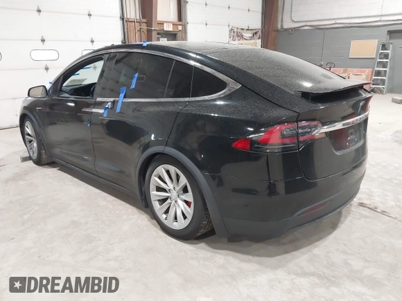 2019 Tesla Model X P90D with VIN 5YJXCAE4XKF180356, listed as a IAAI auction lot 42087926 with 79,041 mi miles. Bid and sale history available at carsss.com. Image 3.