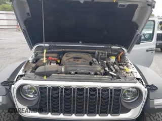 2024 Jeep Wrangler Rubicon with VIN 1C4RJXR61RW224506, listed as a IAAI auction lot 42111434 with 33,689 mi miles and . Bid and sale history available at DreamBid. Image 10.