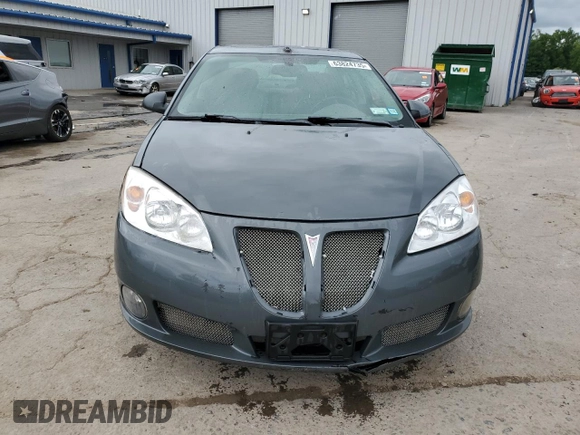 2009 Pontiac G6 GXP 1SA with VIN 1G2ZM577294217264, listed as a Copart auction lot 63824735 with 165,948 mi miles and Salvage title. Bid and sale history available at DreamBid. Image 5.