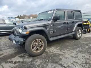2022 Jeep Wrangler Unlimited Sahara Altitude with VIN 1C4HJXEG6NW152576, listed as a Copart auction lot 82034644 with 20,699 mi miles and Salvage Title. Bid and sale history available at DreamBid. Image 1.
