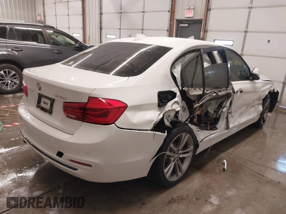 2016 BMW 3 Series 328i with VIN WBA8E9G5XGNT85247, listed as a IAAI auction lot 41578238 with 64,951 mi miles. Bid and sale history available at carsss.com. Image 4.