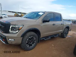 2021 Nissan Titan Pro-4X with VIN 1N6AA1ED9MN519749, listed as a IAAI auction lot 41948962 with 65,807 mi miles and . Bid and sale history available at DreamBid. Image 14.