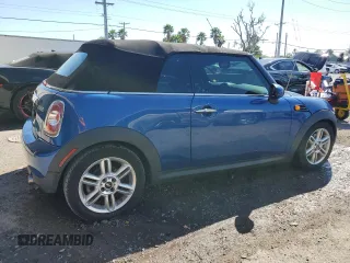 2014 MINI Convertible z VIN WMWZN3C58ET861186, wystawiony jako Copart lot #50585755 z przebiegiem 81 459 mil mil oraz Szkoda całkowita • Salvage title. Historia ofert i sprzedaży dostępna na DreamBid. Obrazek 3.
