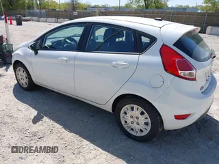 2016 Ford Fiesta S z VIN 3FADP4TJXGM171098, wystawiony jako IAAI lot #42239269 z przebiegiem 93 634 mil mil oraz . Historia ofert i sprzedaży dostępna na DreamBid. Obrazek 3.