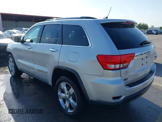 2013 Jeep Grand Cherokee Overland with VIN 1C4RJECG9DC545886, listed as a IAAI auction lot 41998913 with 166,077 mi miles. Bid and sale history available at carsss.com. Image 3.