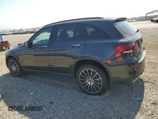 2021 Mercedes-Benz GLC 300 with VIN W1N0G8EB8MF872703, listed as a Copart auction lot 60322035 with 56,609 mi miles and Salvage title. Bid and sale history available at DreamBid. Image 2.