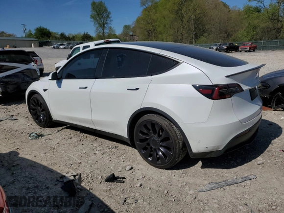 2021 Tesla Model Y Performance with VIN 5YJYGDEF7MF269221, listed as a Copart auction lot 52109785 with 61,619 mi miles and Salvage Title. Bid and sale history available at DreamBid. Image 2.