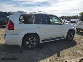 2004 Lexus GX 470 with VIN JTJBT20XX40033938, listed as a Copart auction lot 70871164 with 214,565 mi miles and Salvage Title. Bid and sale history available at carsss.com. Image 3.