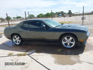 2010 Dodge Challenger R/T z VIN 2B3CJ5DTXAH270086, wystawiony jako IAAI lot #42076162 z przebiegiem 144 051 mil mil oraz . Historia ofert i sprzedaży dostępna na DreamBid. Obrazek 13.