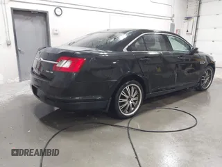 2011 Ford Taurus SEL with VIN 1FAHP2EW4BG160633, listed as a IAAI auction lot 41778406 with 125,934 mi miles. Bid and sale history available at carsss.com. Image 4.