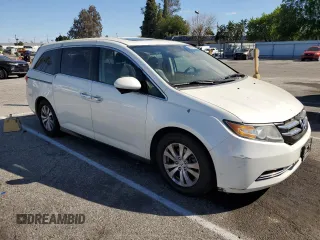 2014 Honda Odyssey EX-L with VIN 5FNRL5H6XEB060557, listed as a Copart auction lot 47141835 with 214,718 mi miles and Clean Title. Bid and sale history available at DreamBid. Image 4.