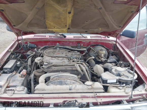 1990 Toyota Pickup SR5 z VIN JT4VN13G8L5037875, wystawiony jako IAAI lot #41986781 z przebiegiem 321 404 mil mil oraz . Historia ofert i sprzedaży dostępna na DreamBid. Obrazek 10.