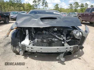 2023 Dodge Challenger R/T Scat Pack Widebody z VIN 2C3CDZFJ2PH694352, wystawiony jako Copart lot #50634415 z przebiegiem 5 340 mil mil oraz Szkoda całkowita • Salvage title. Historia ofert i sprzedaży dostępna na DreamBid. Obrazek 5.
