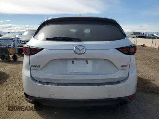 2018 Mazda CX-5 Grand Touring with VIN JM3KFADM5J1350107, listed as a Copart auction lot 50332375 with 110,319 mi miles and Salvage Title. Bid and sale history available at DreamBid. Image 6.