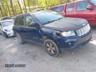 2014 Jeep Compass Latitude with VIN 1C4NJCEAXED531969, listed as a IAAI auction lot 42009220 with 189,303 mi miles. Bid and sale history available at carsss.com. Image 1.