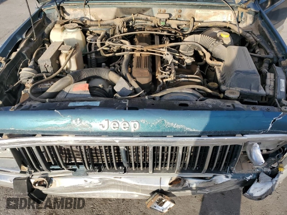 1995 Jeep Cherokee Country with VIN 1J4FJ78S5SL636284, listed as a Copart auction lot 76145234 with 104,048 mi miles and Salvage Title. Bid and sale history available at carsss.com. Image 12.