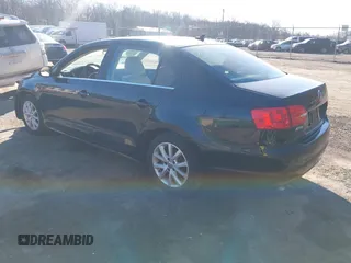 2013 Volkswagen Jetta Sedan SE w/Convenience/Sunroof with VIN 3VWDX7AJ9DM424595, listed as a IAAI auction lot 41807615 with 102,971 mi miles. Bid and sale history available at carsss.com. Image 3.