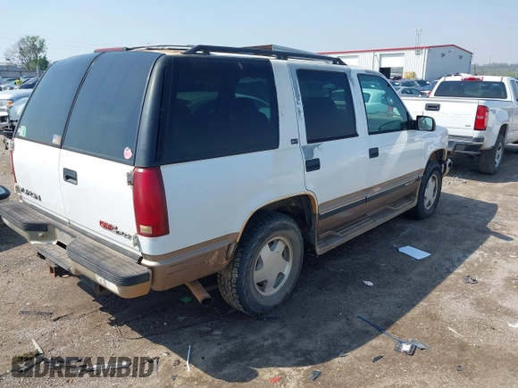 1996 GMC Yukon with VIN 1GKEK13R2TJ746811, listed as a IAAI auction lot 41955840 with 2,242,108 mi miles. Bid and sale history available at carsss.com. Image 4.