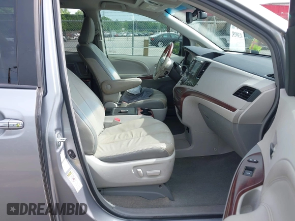 2013 Toyota Sienna XLE with VIN 5TDDK3DC3DS054803, listed as a IAAI auction lot 42389252 with 185,843 mi miles and . Bid and sale history available at DreamBid. Image 5.
