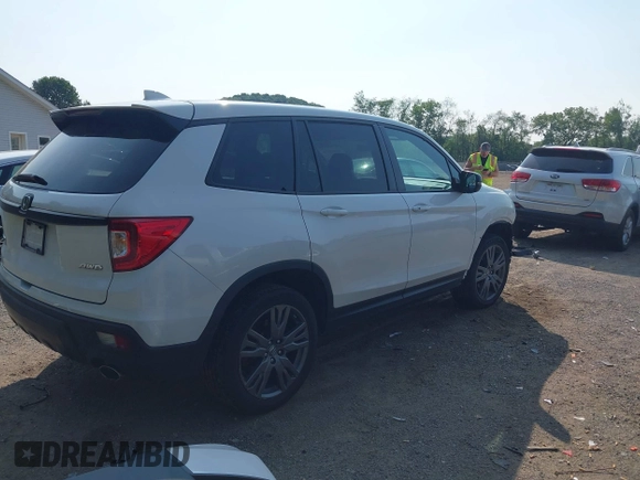 2019 Honda Passport EX-L with VIN 5FNYF8H56KB029748, listed as a IAAI auction lot 42405028 with 59,009 mi miles and . Bid and sale history available at DreamBid. Image 4.