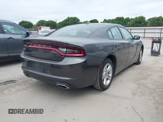 2023 Dodge Charger SXT with VIN 2C3CDXBG2PH530095, listed as a IAAI auction lot 42016658 with 50,528 mi miles and . Bid and sale history available at DreamBid. Image 4.