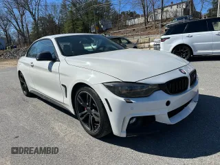 2014 BMW 4 Series 435i with VIN WBA3T3C57EP736698, listed as a Copart auction lot 52739335 with 104,403 mi miles and Clean Title. Bid and sale history available at carsss.com. Image 4.