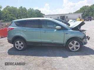 2013 Ford Escape SE with VIN 1FMCU9G98DUB92921, listed as a IAAI auction lot 42618998 with 135,497 mi miles and . Bid and sale history available at DreamBid. Image 13.