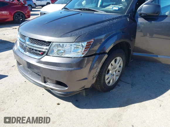 2015 Dodge Journey SE z VIN 3C4PDCAB5FT739266, wystawiony jako IAAI lot #41725086 z przebiegiem 134 109 mil mil oraz . Historia ofert i sprzedaży dostępna na DreamBid. Obrazek 6.