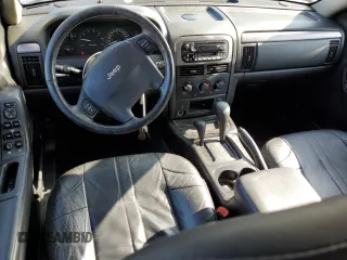2004 Jeep Grand Cherokee Laredo z VIN 1J4GW48S14C350441, wystawiony jako Copart lot #59434415 z przebiegiem 78 449 mil mil oraz Czysty tytuł • Clean title. Historia ofert i sprzedaży dostępna na DreamBid. Obrazek 8.